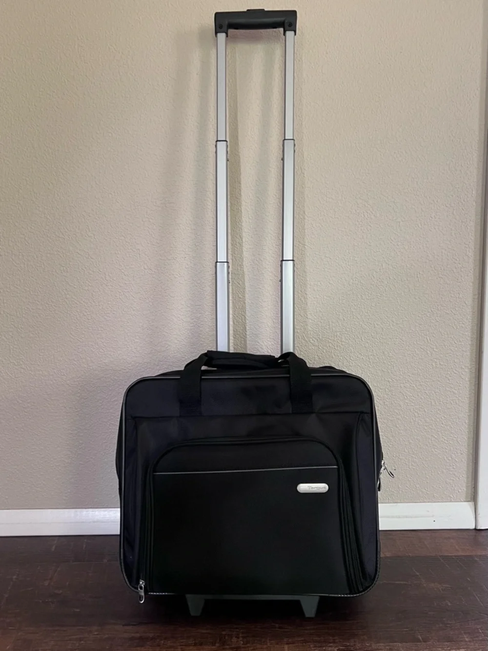 Targus rolling work bag. Black. Silver-toned hardware.